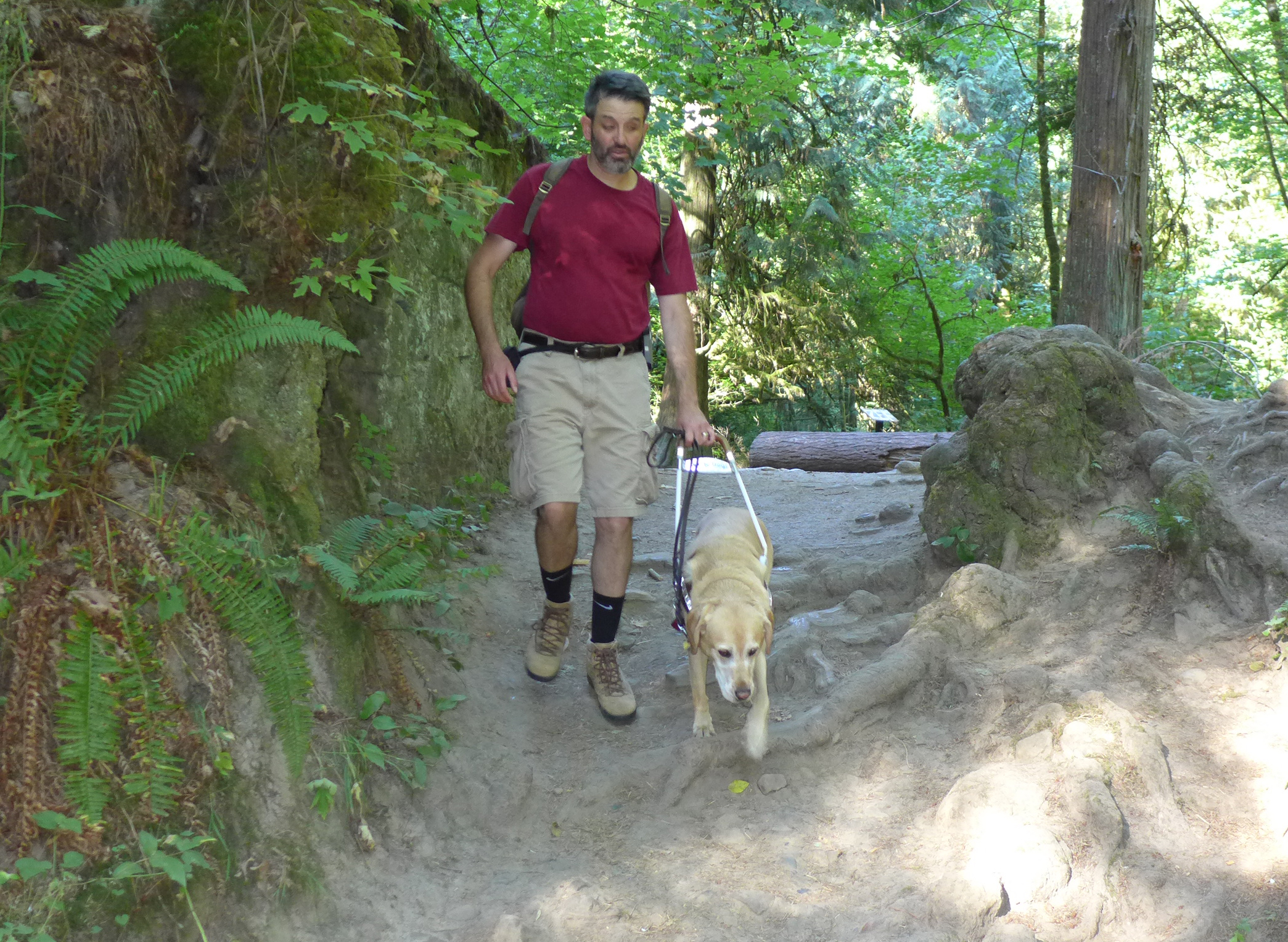 Alex Schay and Clifton on Wildwood Trail. Photo: Wesley Mahan, NW Examiner