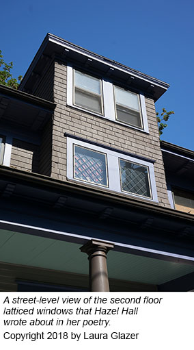 A street-level view of the second floor window